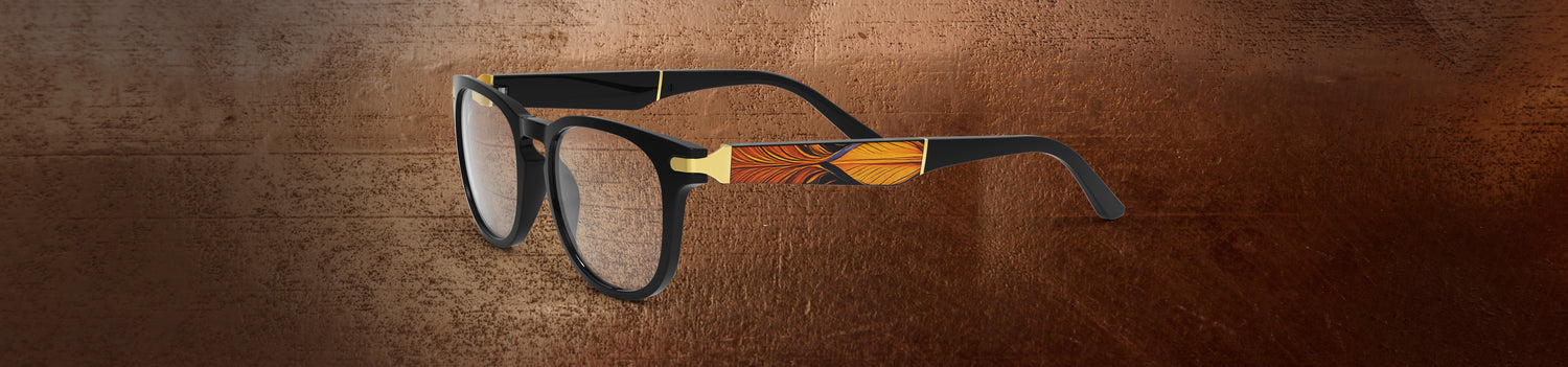 Eyeglasses on a brown textured background