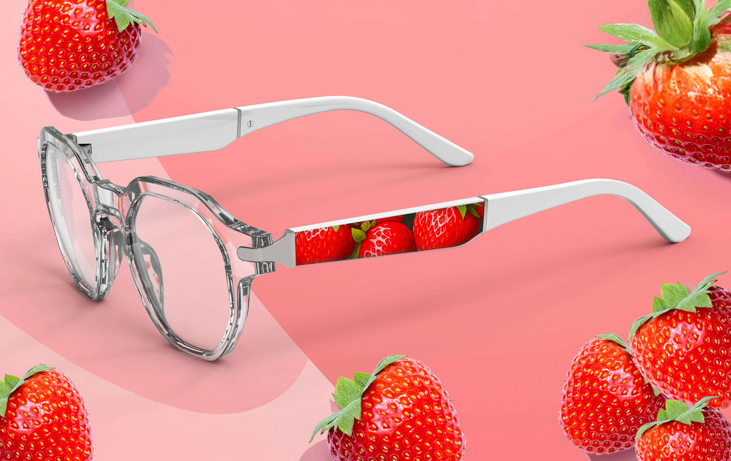 Eyeglasses with strawberry design on a pink background