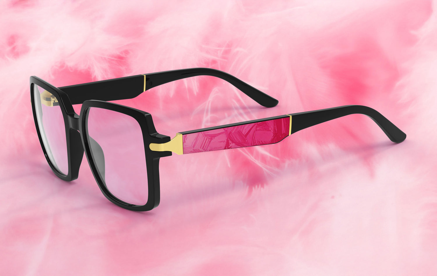 Black-framed glasses with pink accents on a pink tie-dye background