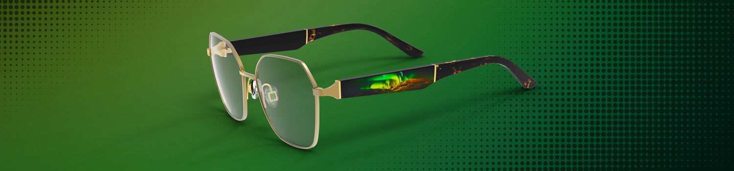 Eyeglasses on a green background