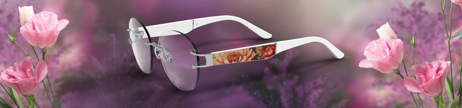 White sunglasses with floral design on a purple background with pink flowers