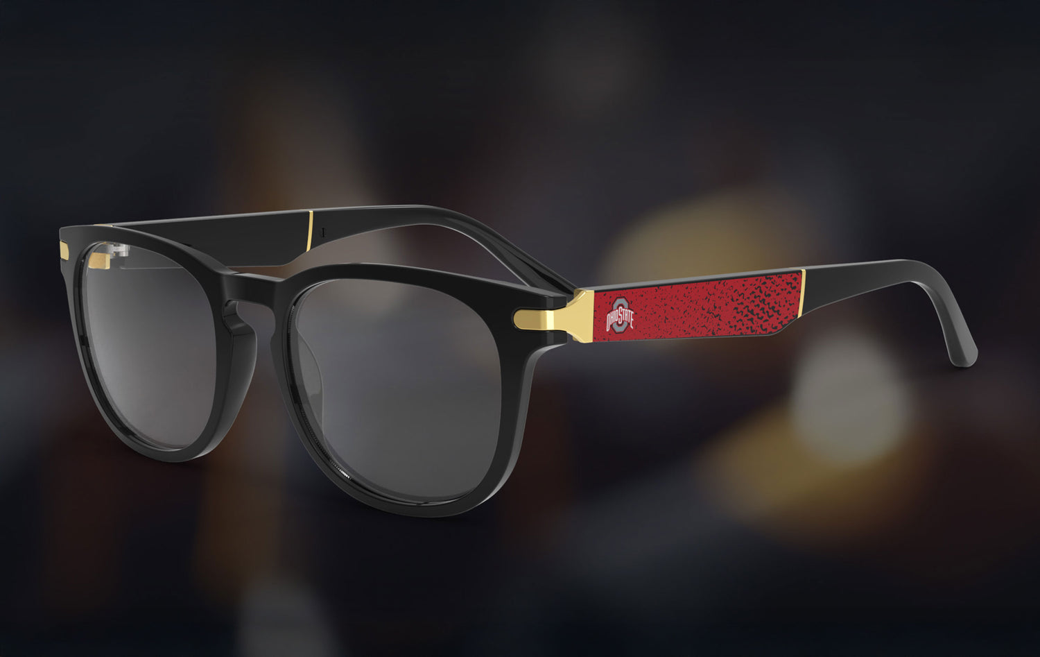 Eyewear with black frame and red side panels that features the Ohio State logo on a blurred background