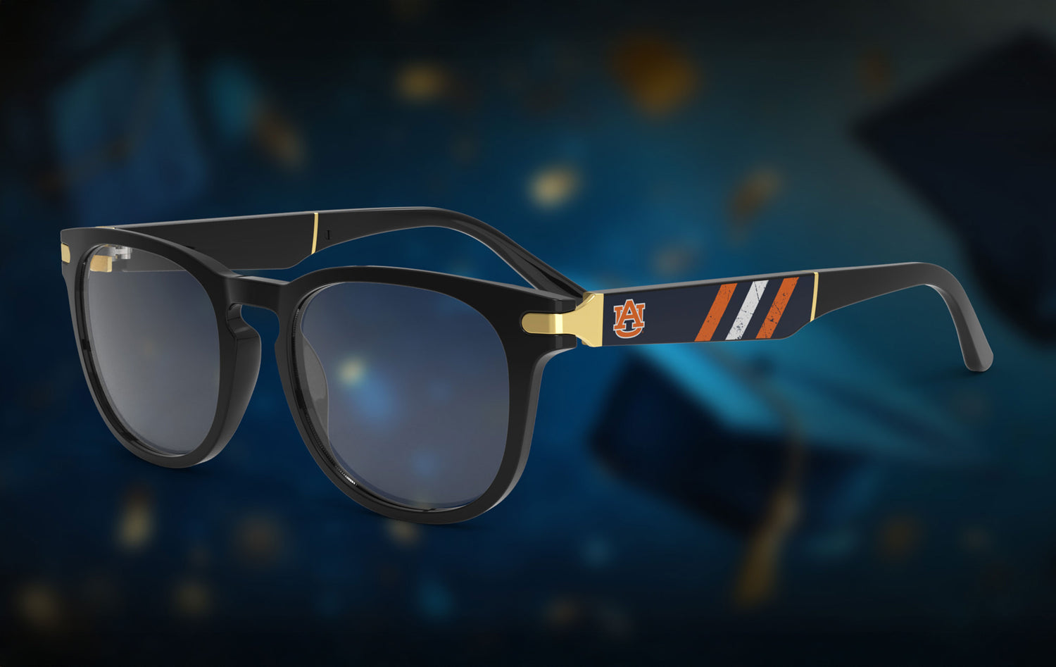 Sunglasses with an Auburn University logo on a dark background