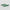 Two green patterned objects on a light gray background