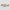 Two rectangular objects with colorful abstract design on a light gray background
