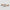 Two rectangular objects with colorful abstract design on a light gray background