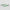 Two green and white patterned blades on a light gray background
