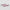 Two pink rectangular objects with black butterfly patterns on a light gray background