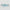 Two blue objects with yellow floral patterns on a gray background