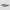 Two black rectangular objects with purple geometric pattern on a light gray background