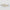 Two rectangular objects with black floral pattern on beige