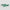 Two Slytherin-themed Allegiant eyewear blades on a light gray background