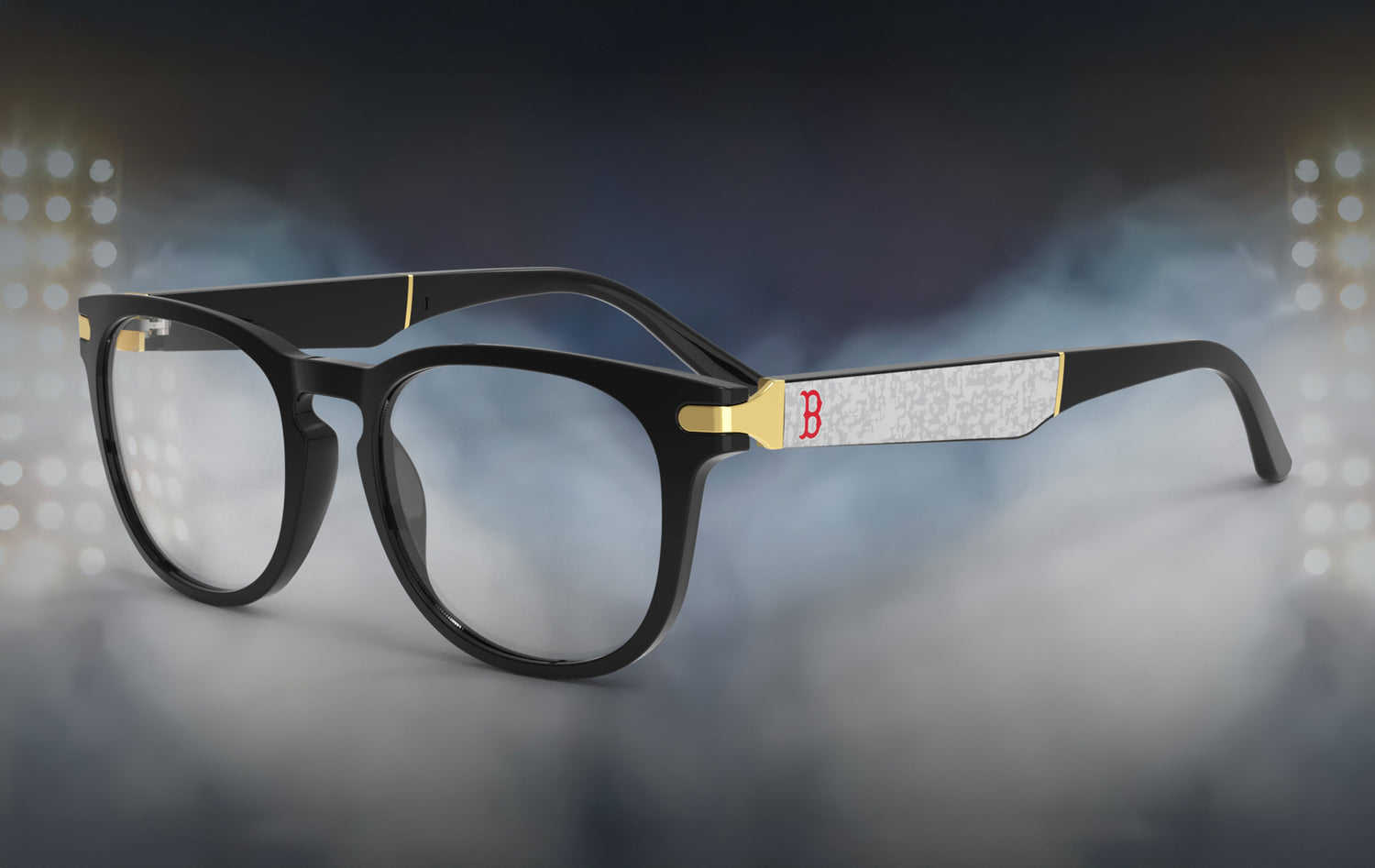 Black eyeglasses with gold accents on a blurred night-lit background