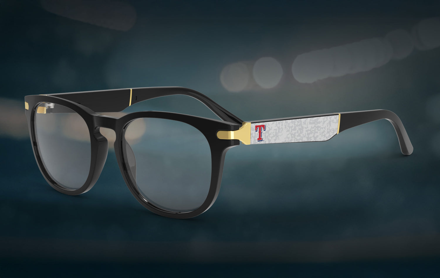 Black-framed glasses with gold accents on a dark blue background