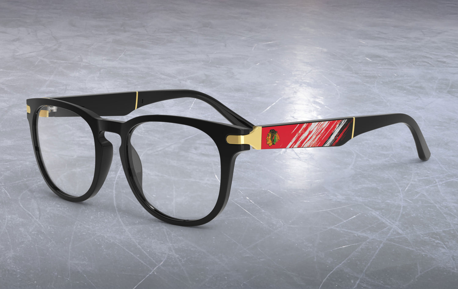 Black eyeglasses with a red and yellow logo on a gray textured background
