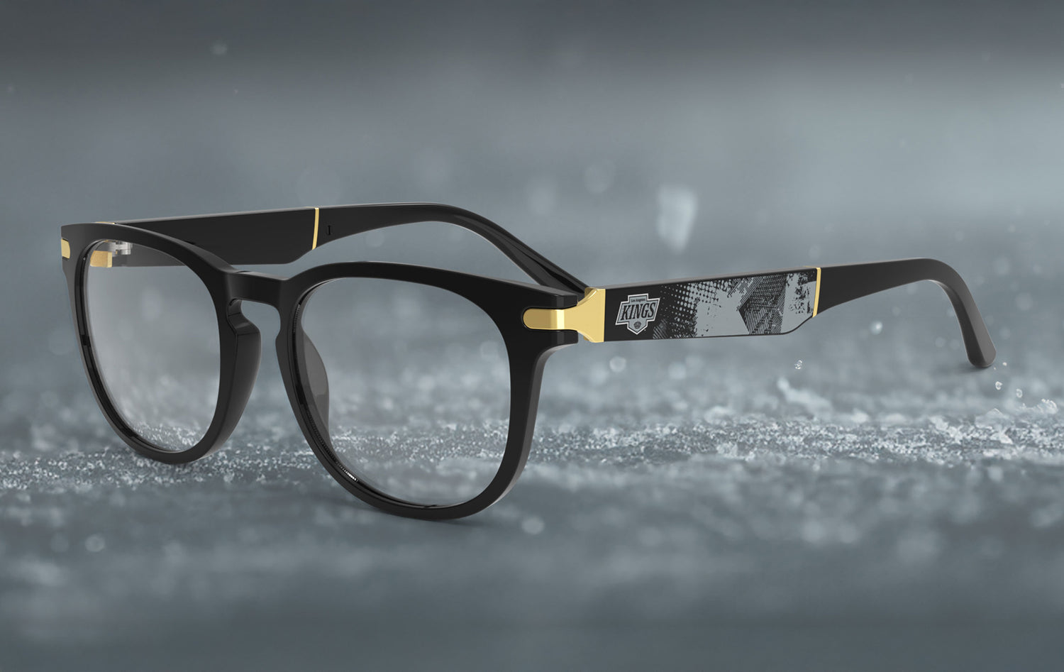 Allegiant glasses with temple blade showing Los Angeles Kings logo against a black and grey abstract design in a hockey rink setting.