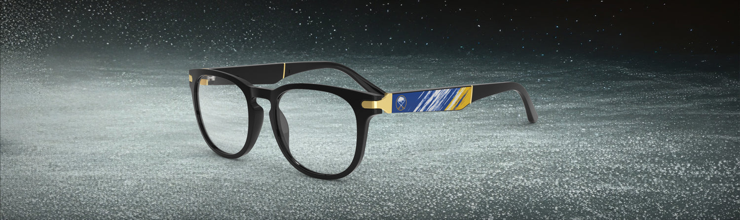 Eyeglasses with a black frame against a textured gray background