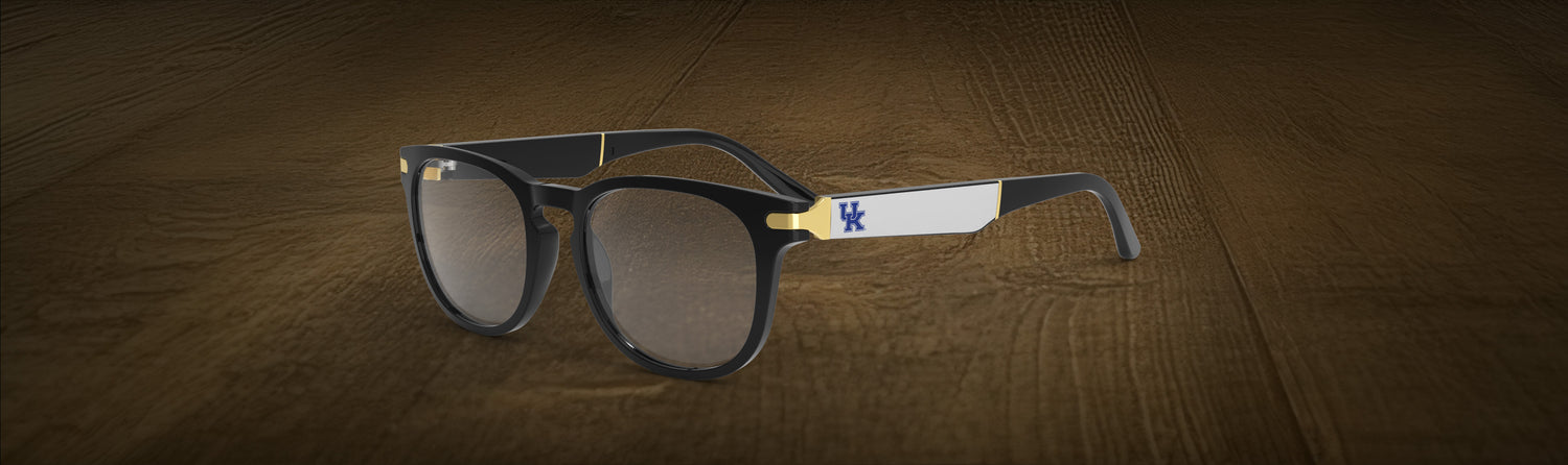 Glasses with a logo on a wooden surface