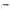 Eyeglasses featuring a navy blue scaled design on the temple leg blade against white background