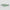 Two green and black striped blades on a light gray background