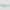 Two blue objects with yellow floral patterns on a gray background