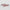 Two pink zebra-striped rectangular objects on a light gray background