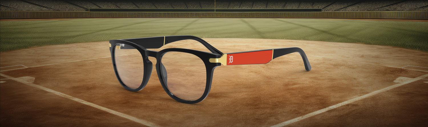 Eyeglasses with an orange temple blade featuring a 'D' for Detroit logo 
