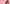 Woman blowing bubbles with a pink wand against a pink background