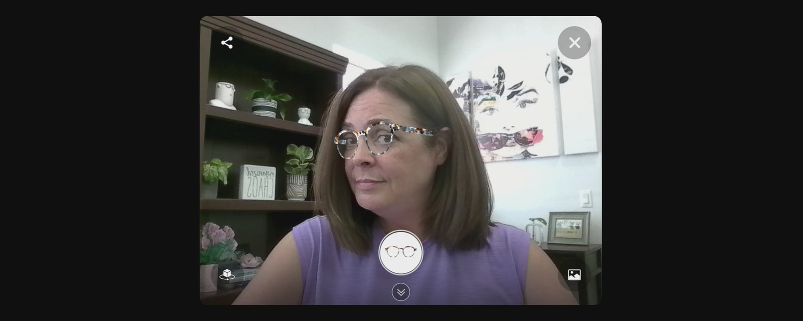 Person using Allegiant Eyewear's virtual try-on tool to preview eyeglass frames in real time